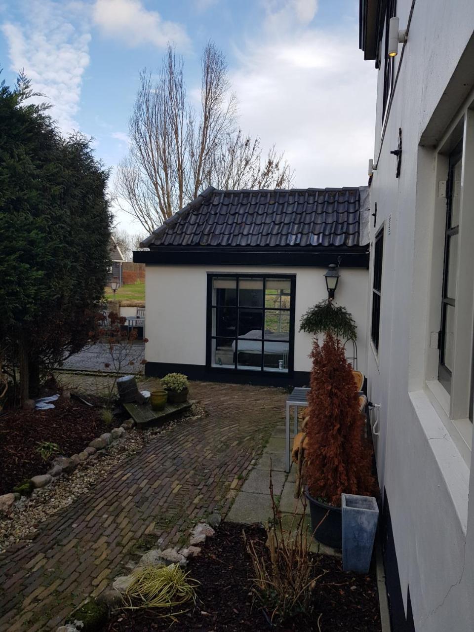 Cafe Brasserie Het Heerenhuis Het Kalf Bagian luar foto